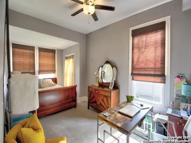 a room with furniture and a window