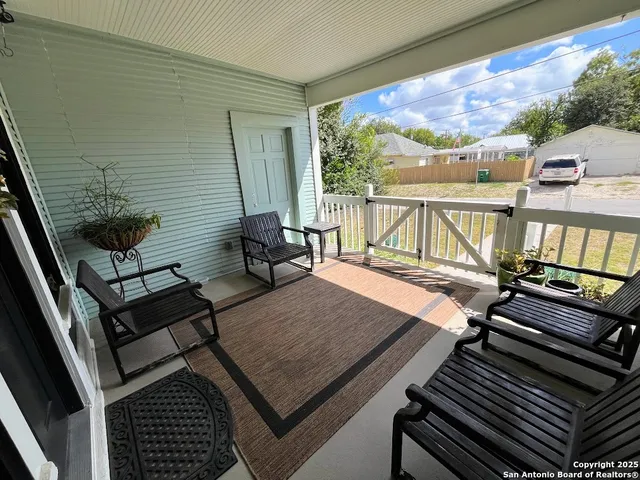 a view of a workspace with furniture