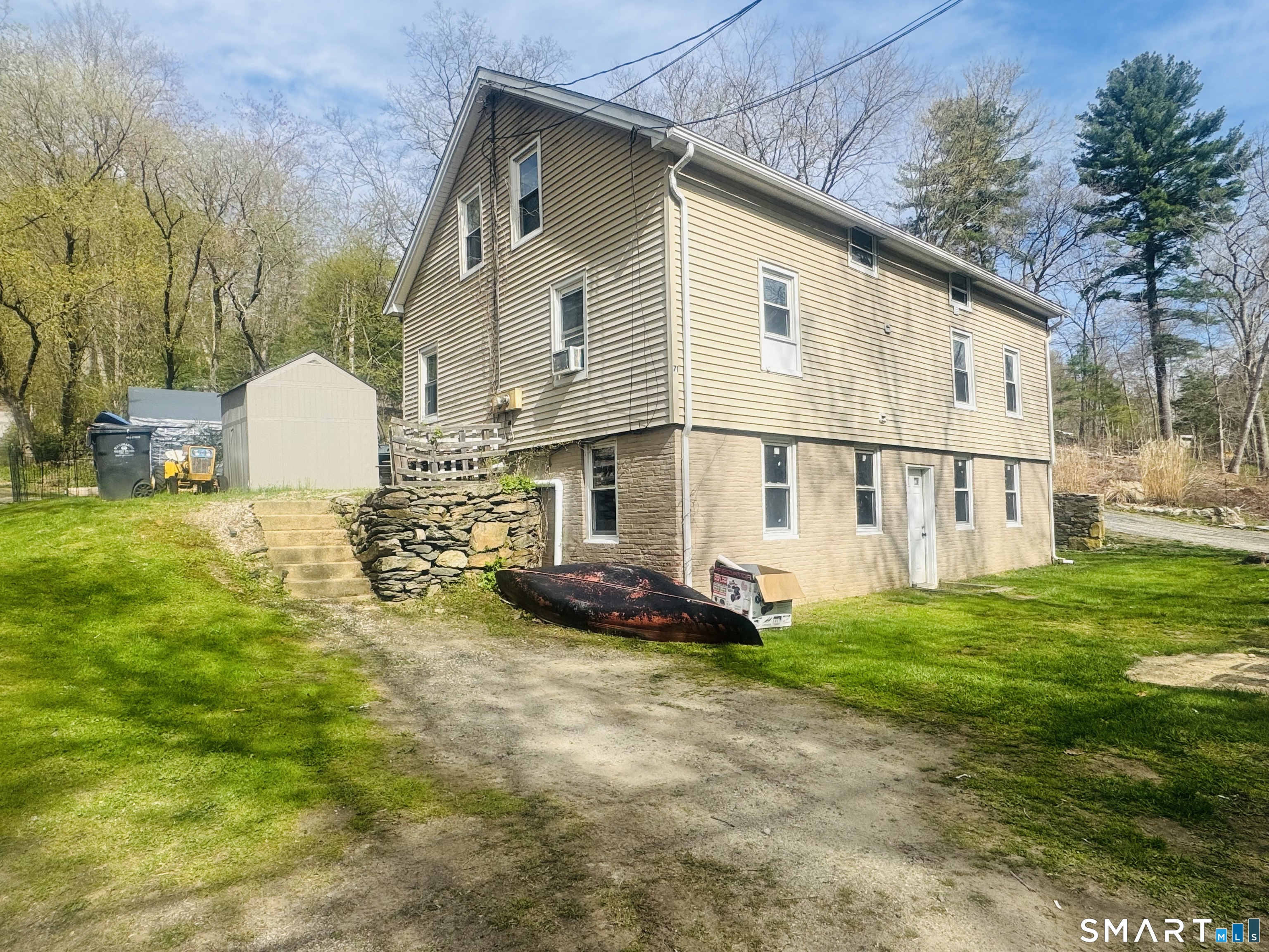 71 Pineville Road Killingly, CT 06241 - Photo 1 of 1 a view of a house with backyard and trees