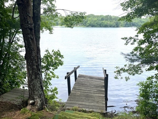 390 Hatchville Road Falmouth, MA 02536 - Photo 3 of 9 a view of a lake with mountain in the background