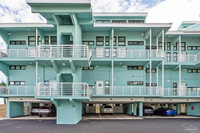 a front view of a building with many windows