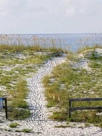 a view of a ocean with a beach