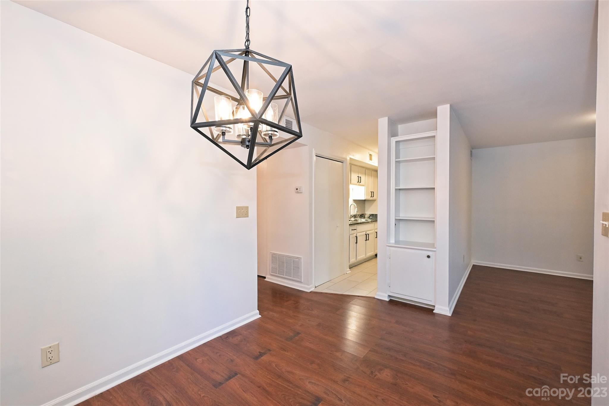 430 Queens Road, Unit 612 Charlotte, NC 28207 - Photo 11 of 22 wooden floor in an empty room