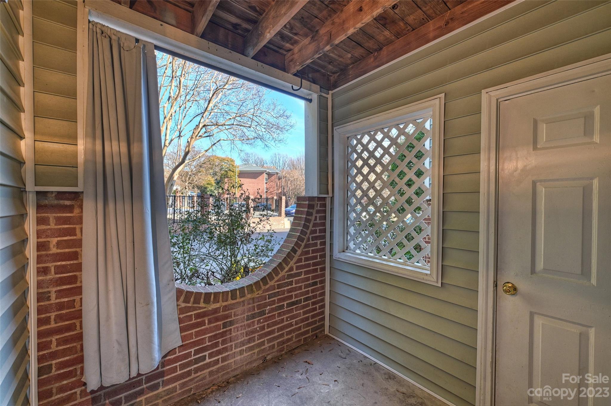430 Queens Road, Unit 612 Charlotte, NC 28207 - Photo 2 of 22 a view of a glass door