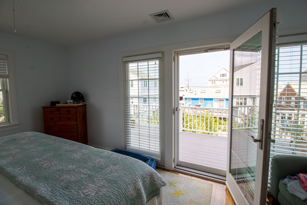 117 River Street Scituate, MA 02050 - Photo 15 of 23 a bedroom with a bed and a window