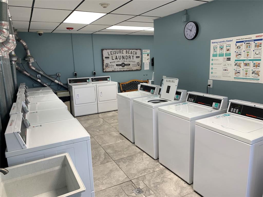 200 South Birch Road, Unit 806 Fort Lauderdale, FL 33316 - Photo 14 of 20 a utility room with dryer and washer