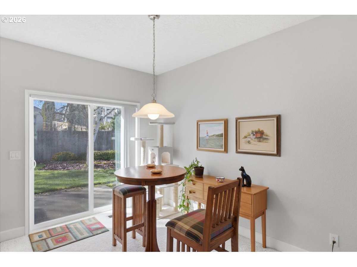 2066 Northwest Violet Avenue Albany, OR 97321 - Photo 24 of 48 a view of a dining room with furniture window and outside view