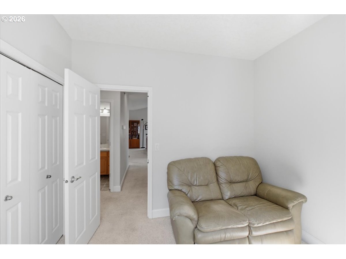 2066 Northwest Violet Avenue Albany, OR 97321 - Photo 25 of 48 a living room with furniture and a ceiling fan