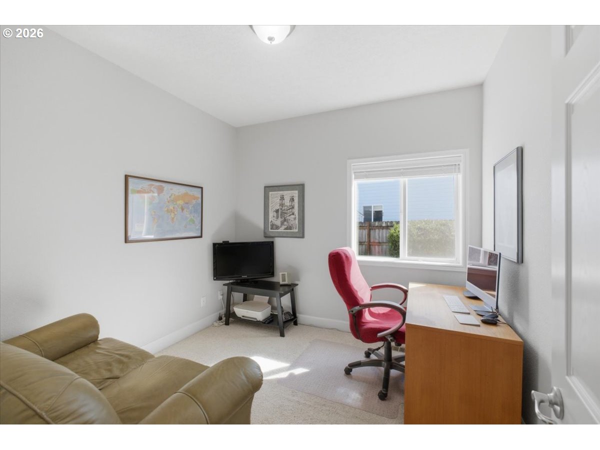 2066 Northwest Violet Avenue Albany, OR 97321 - Photo 26 of 48 a living room with furniture and a window