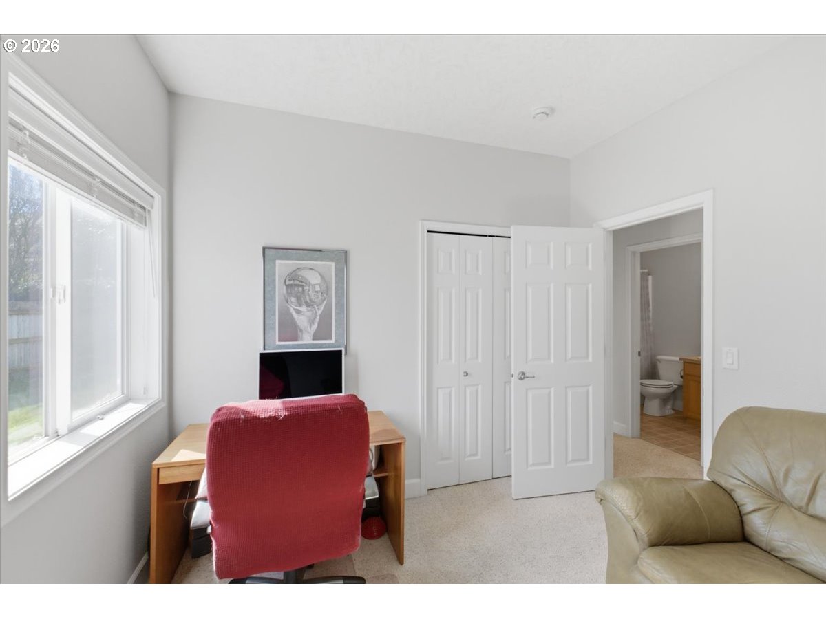 2066 Northwest Violet Avenue Albany, OR 97321 - Photo 27 of 48 a living room with furniture window and wall painting