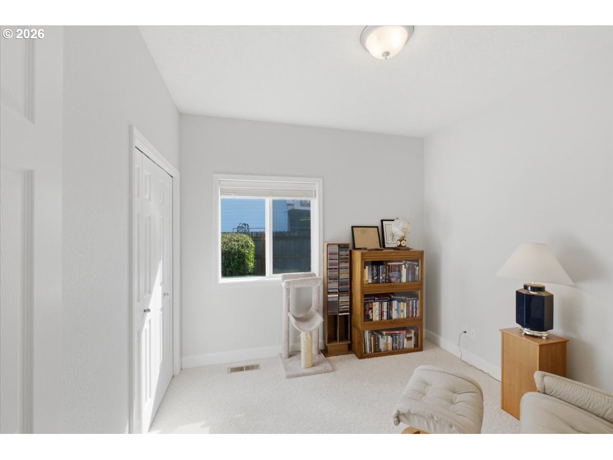 2066 Northwest Violet Avenue Albany, OR 97321 - Photo 31 of 48 a living room with furniture and next to a window