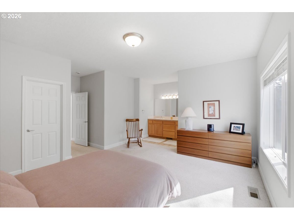 2066 Northwest Violet Avenue Albany, OR 97321 - Photo 33 of 48 a bedroom with a bed and painting on the wall