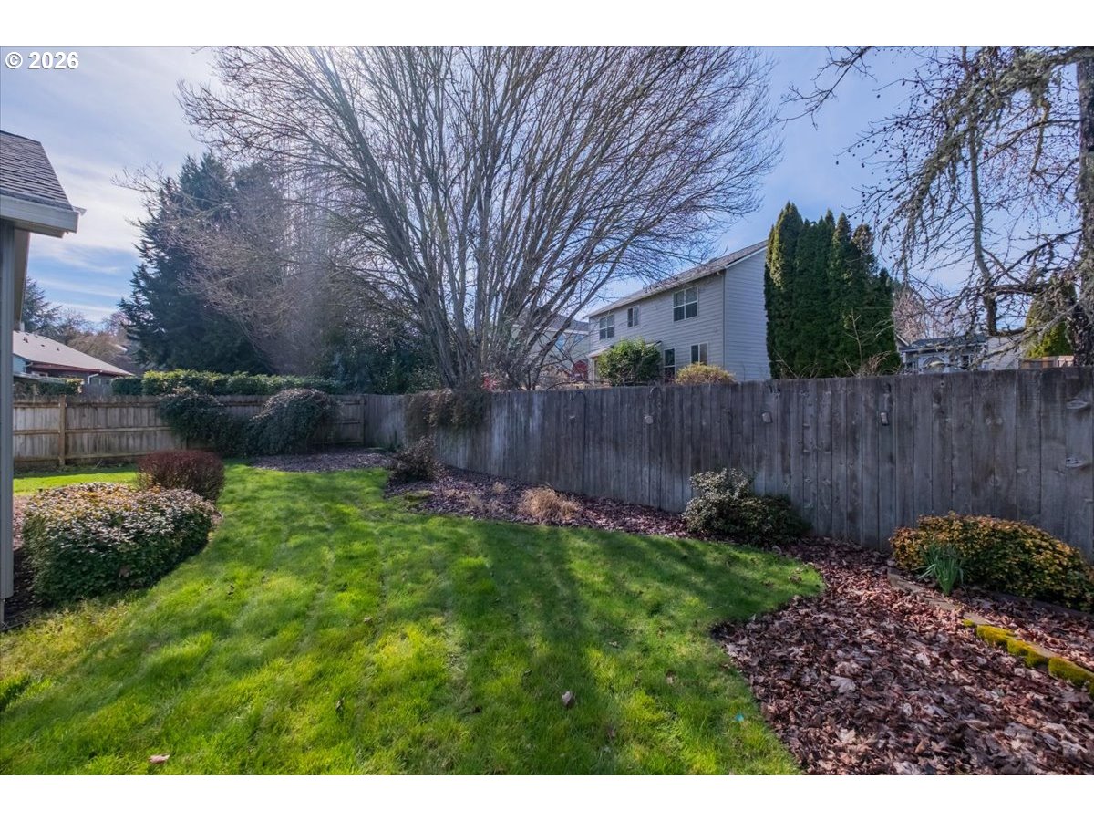 2066 Northwest Violet Avenue Albany, OR 97321 - Photo 45 of 48 a view of backyard with wooden fence