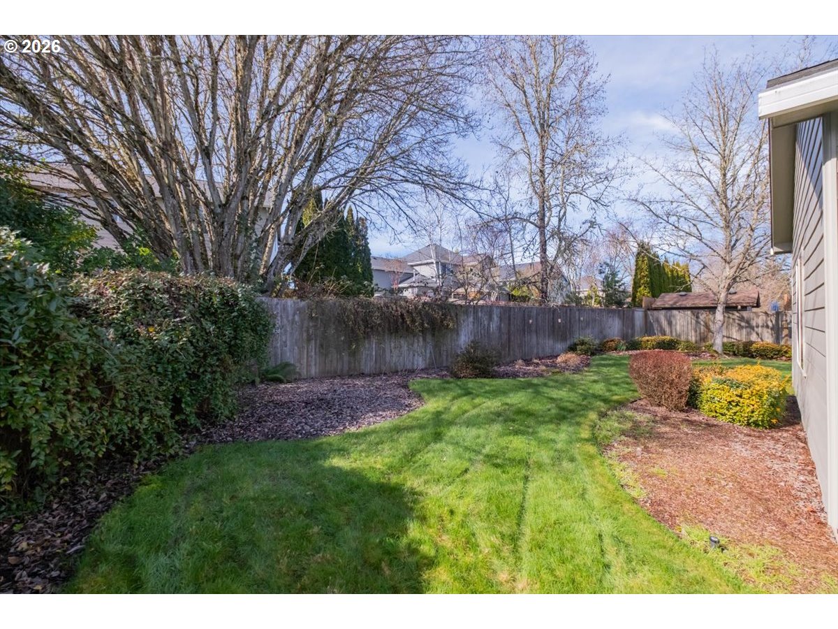 2066 Northwest Violet Avenue Albany, OR 97321 - Photo 46 of 48 a view of a backyard with wooden fence