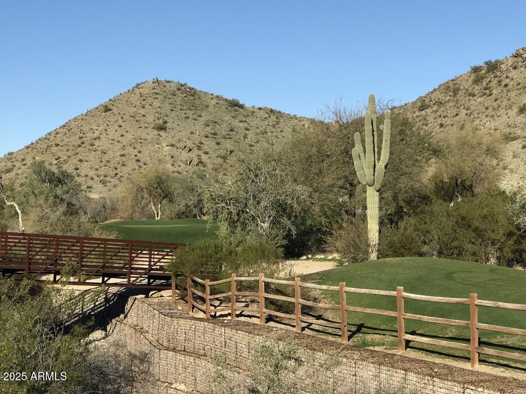 8833 South 51st Street, Unit 3 Phoenix, AZ 85044 - Photo 25 of 26 a view of a terrace with a bench