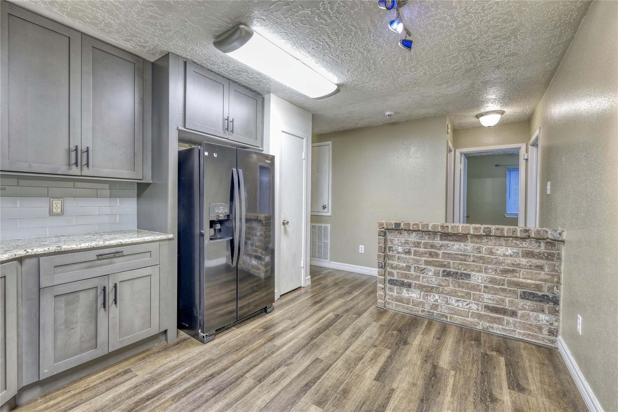13331 Boyer Lane Houston, TX 77015 - Photo 6 of 21 a view of kitchen with cabinets and stainless steel appliances