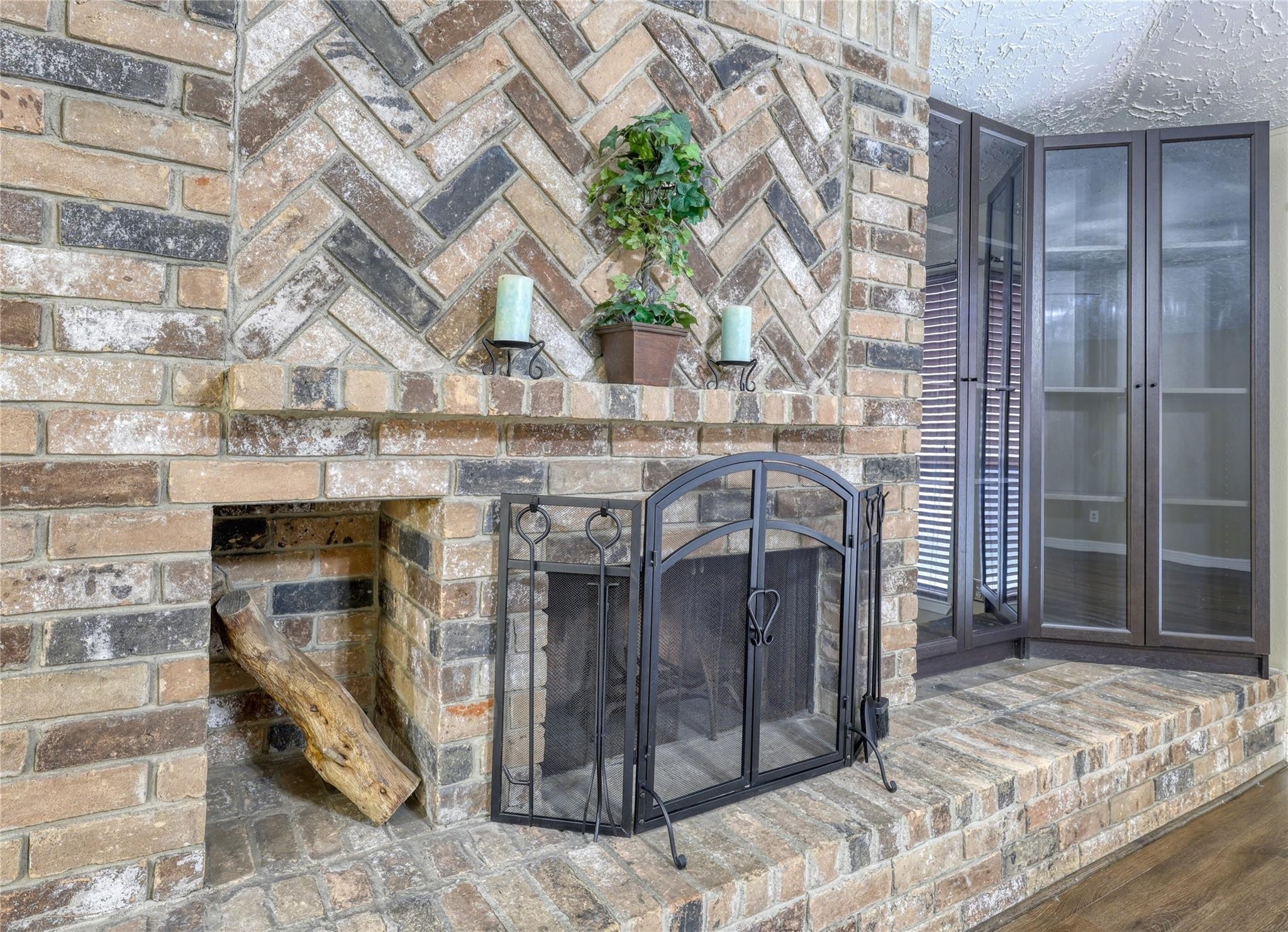 13331 Boyer Lane Houston, TX 77015 - Photo 10 of 21 a view of a fireplace with wooden walls