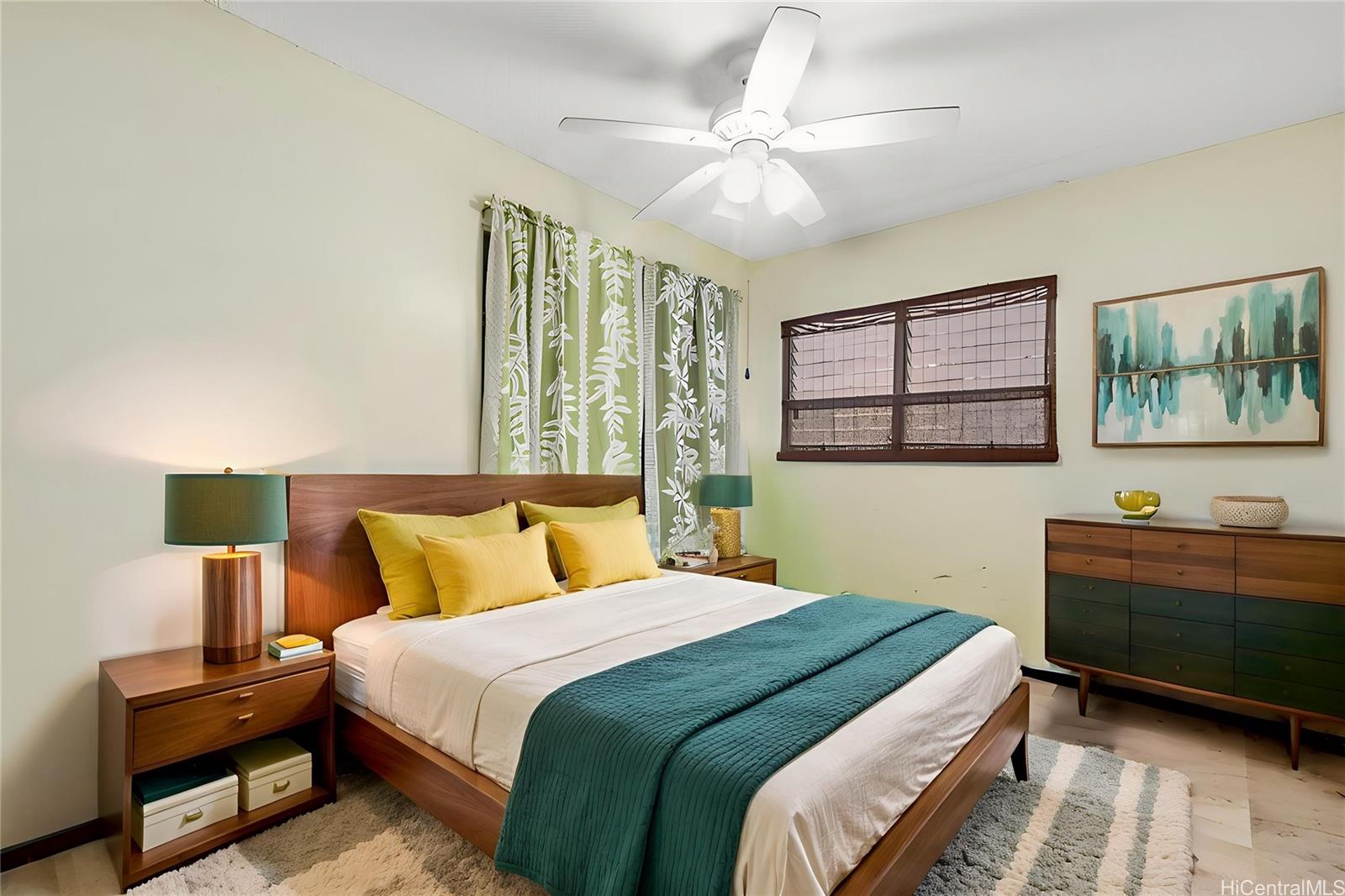 96-214 Waiawa Road, Unit 85 Pearl City, HI 96782 - Photo 6 of 10 a bedroom with a bed and a window