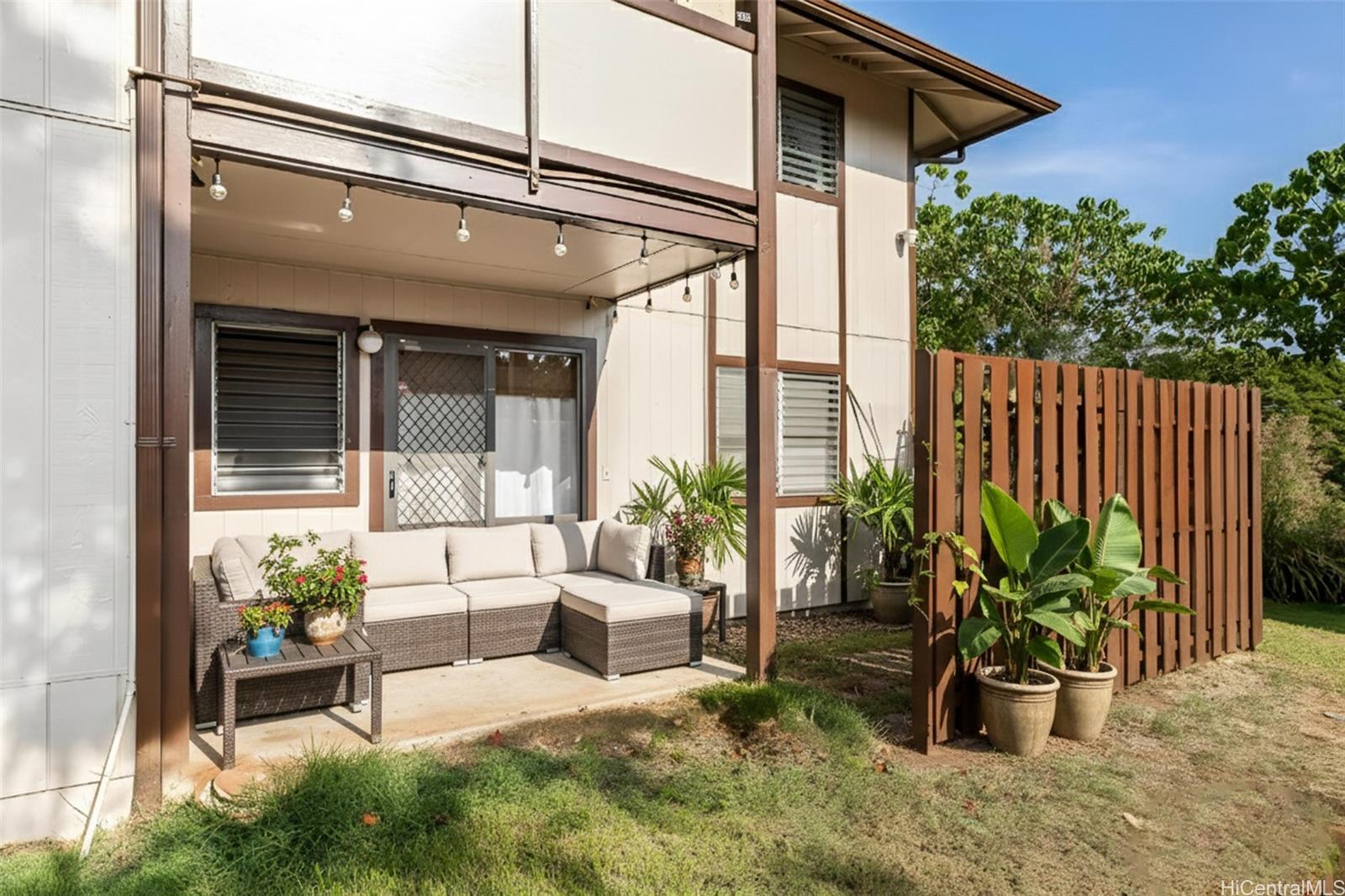 96-214 Waiawa Road, Unit 85 Pearl City, HI 96782 - Photo 10 of 10 a view of a chair and table in the patio