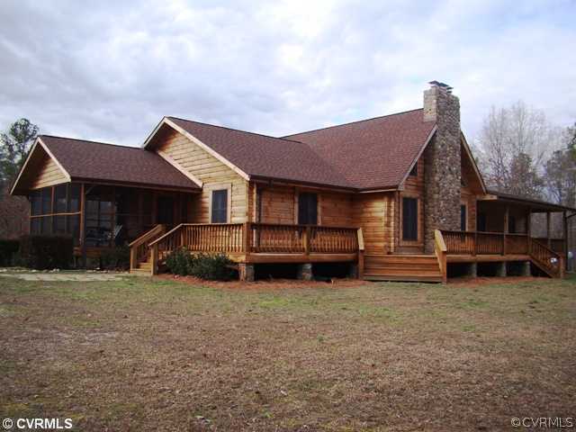 4826 Tatum Road Disputanta, VA 23842 - Photo 1 of 24 a view of a house with a sink and a bench