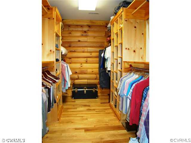 4826 Tatum Road Disputanta, VA 23842 - Photo 17 of 24 a view of walk in closet with clothes