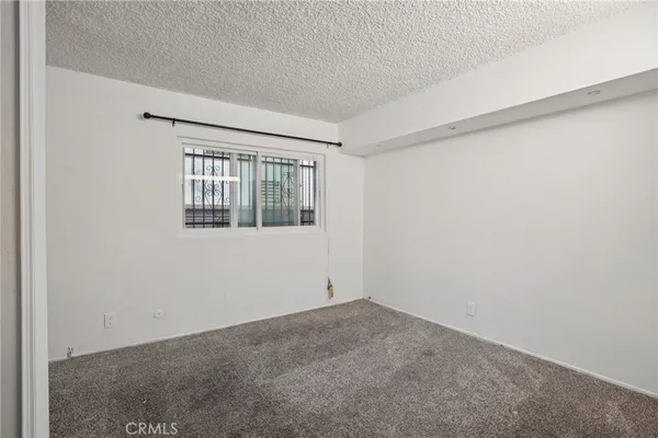 a view of empty room with windows