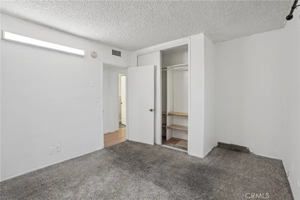 a bathroom with a sink and cabinets