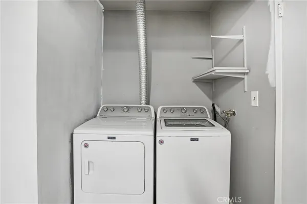 a view of a kitchen with a sink