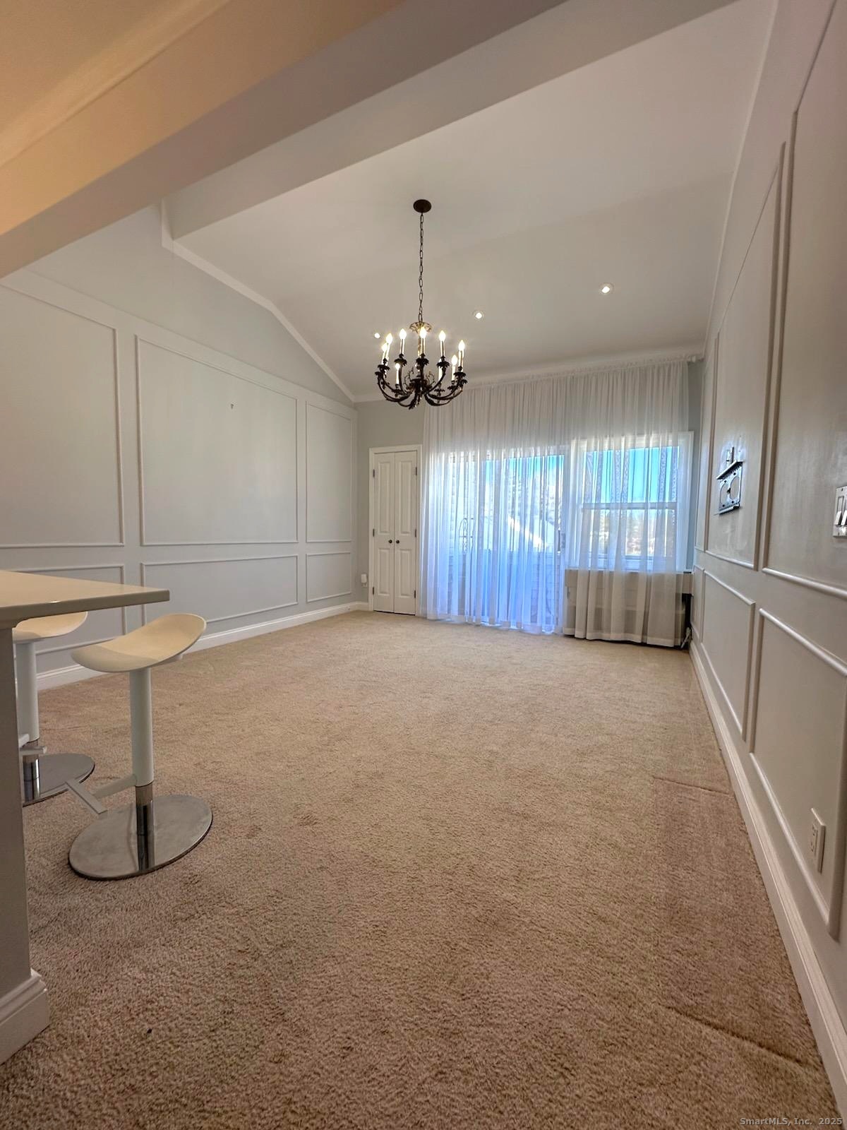 163 South Street, Unit 85 Danbury, CT 06810 - Photo 5 of 18 a view of an empty room with a window