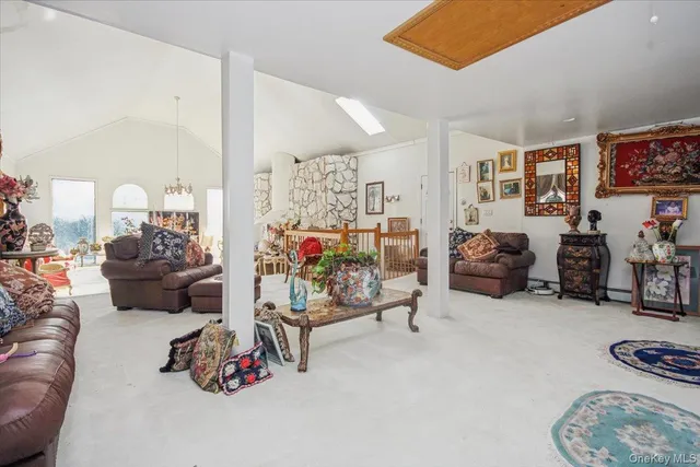 a view of a livingroom with furniture and a couch