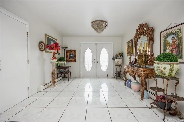 a view of hall way with furniture