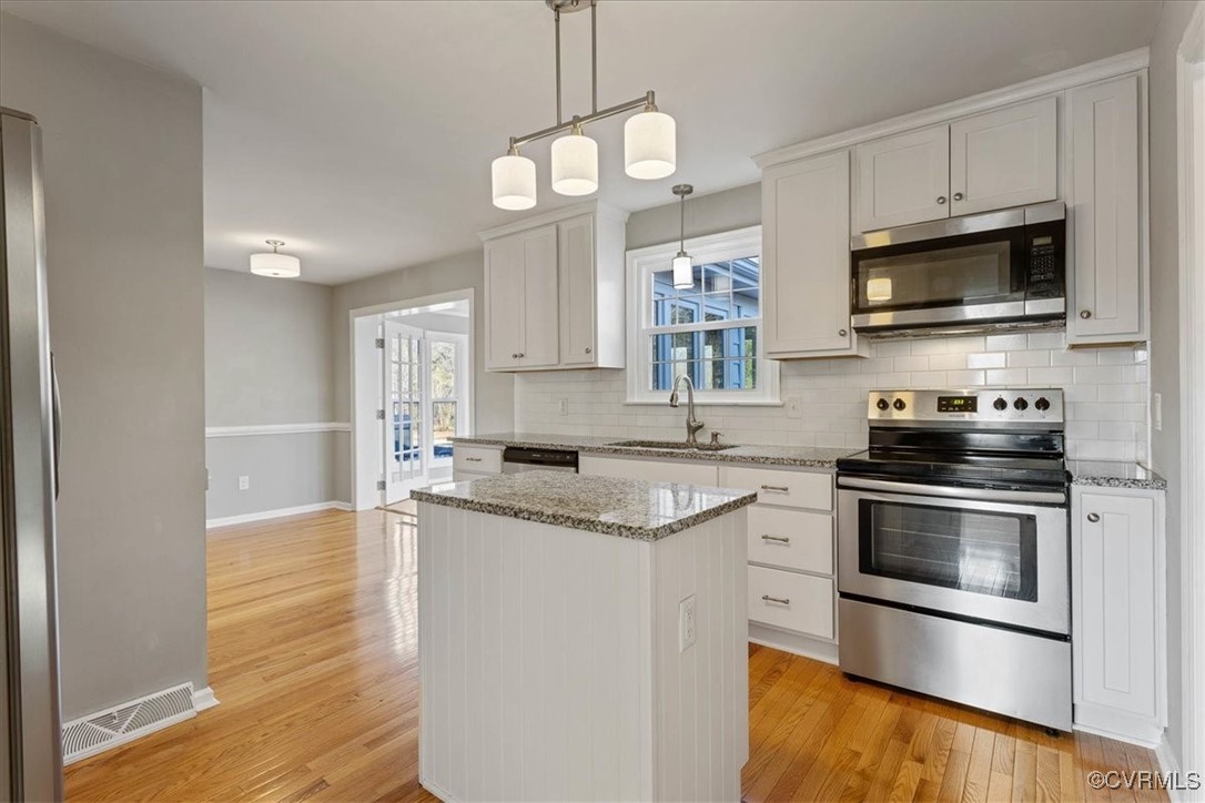 1007 Forestview Drive Colonial Heights, VA 23834 - Photo 14 of 40 Kitchen featuring pendant lighting, sink, applianc