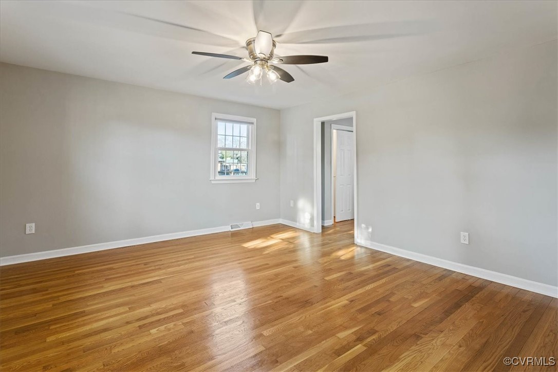 1007 Forestview Drive Colonial Heights, VA 23834 - Photo 21 of 40 1st Floor Primary Bedroom with hardwood floors and