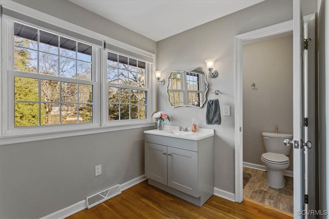 1007 Forestview Drive Colonial Heights, VA 23834 - Photo 22 of 40 Dressing area with hardwood flooring and vanity