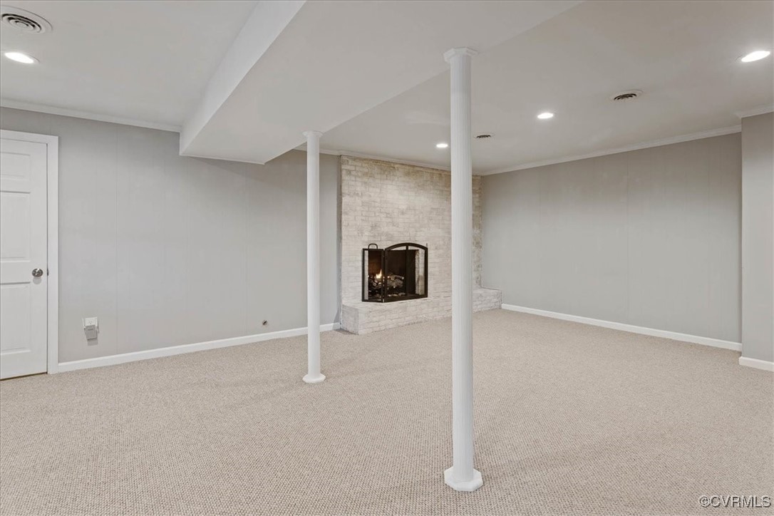 1007 Forestview Drive Colonial Heights, VA 23834 - Photo 33 of 40 Basement featuring a gas log fireplace, ornamental