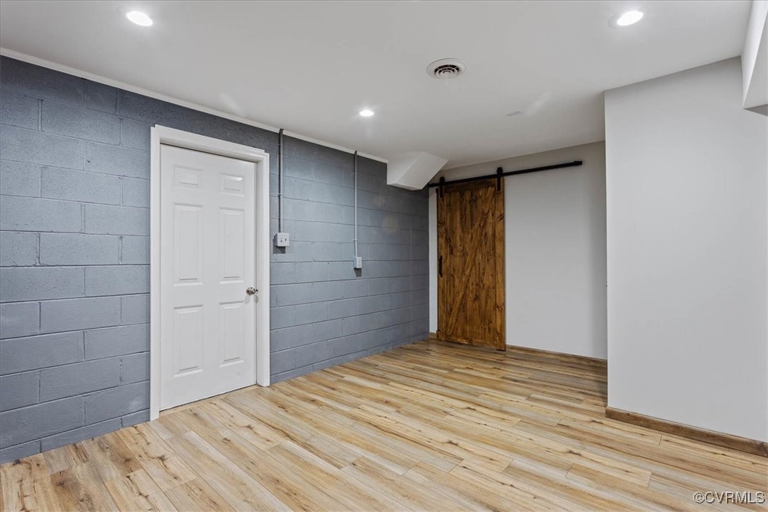 1007 Forestview Drive Colonial Heights, VA 23834 - Photo 35 of 40 Basement featuring a barn door and LV floors