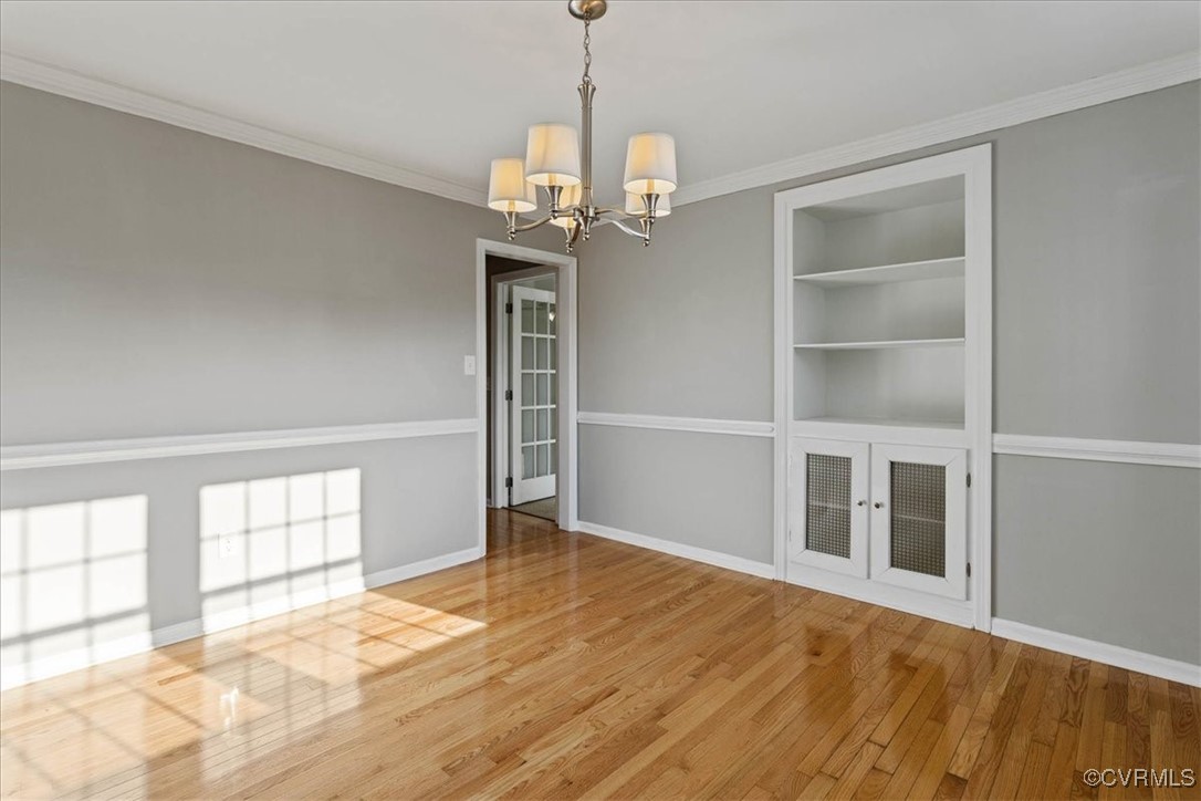 1007 Forestview Drive Colonial Heights, VA 23834 - Photo 9 of 40 Dining room featuring crown molding, hardwood floo