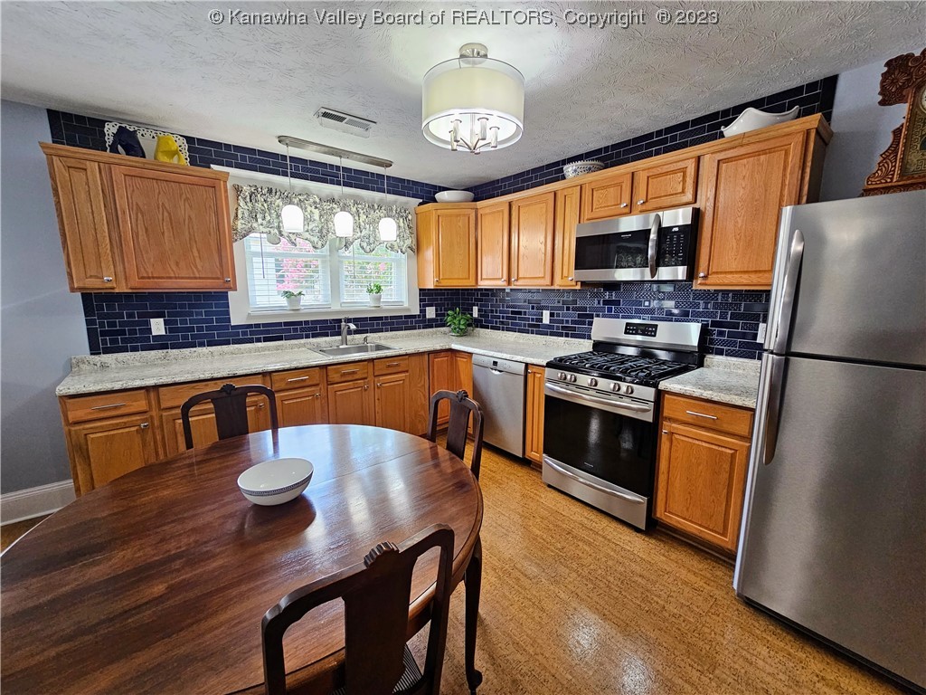 1007 Main Street Point Pleasant, WV 25550 - Photo 20 of 44 Gas Range, Bosch Dishwasher with all Kitchen Appliances Conveying