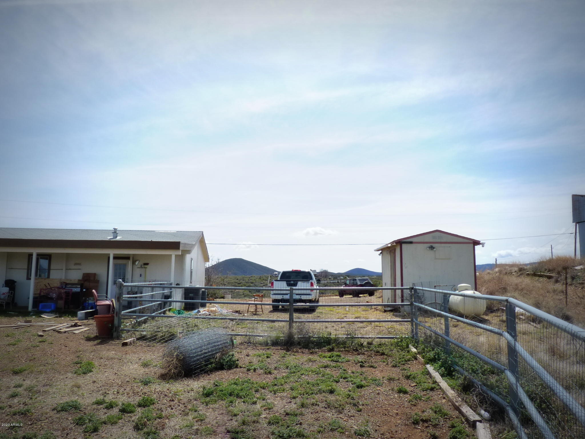 10810 Powerline Road Dewey, AZ 86327 - Photo 30 of 50 Gated Back Yard view towards the hous