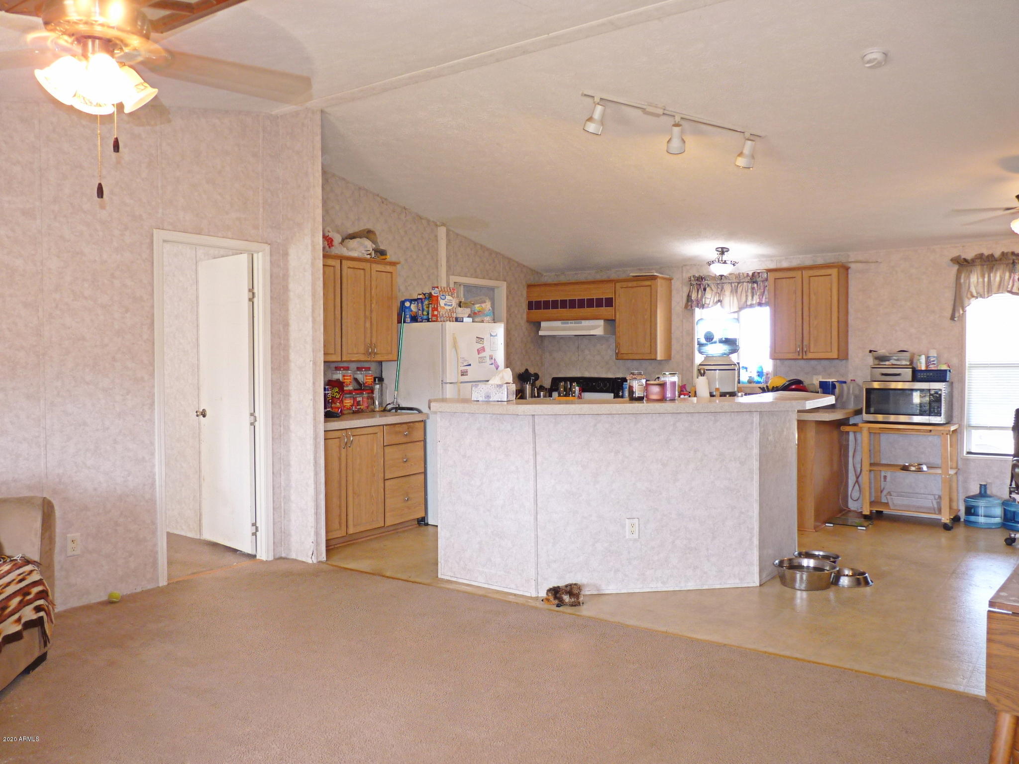 10810 Powerline Road Dewey, AZ 86327 - Photo 4 of 50 Living Room view towards the Kitchen_M