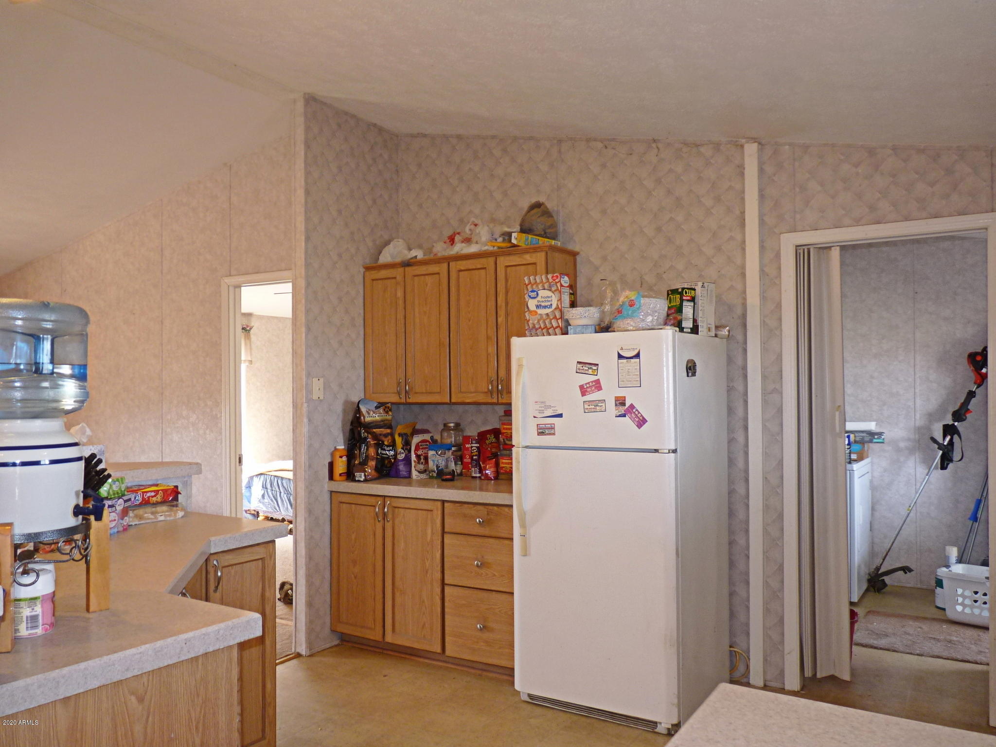 10810 Powerline Road Dewey, AZ 86327 - Photo 10 of 50 Kitchen view towards the Master Bedroo
