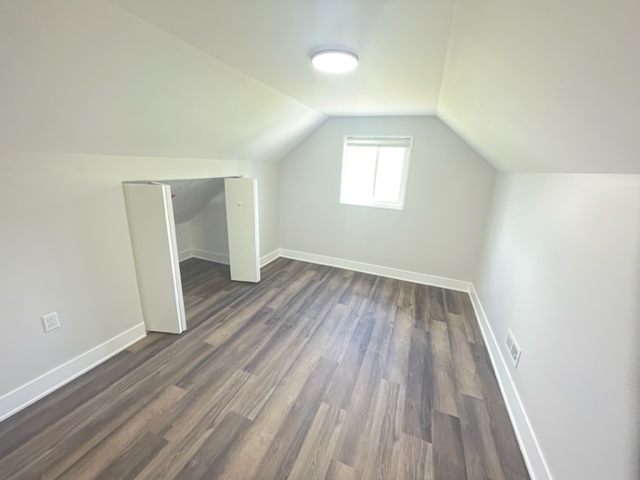 30 Apache Street Park Forest, IL 60466 - Photo 11 of 13 an empty room with wooden floor and windows
