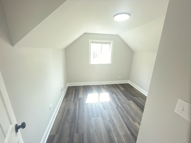 30 Apache Street Park Forest, IL 60466 - Photo 10 of 13 an empty room with wooden floor and windows