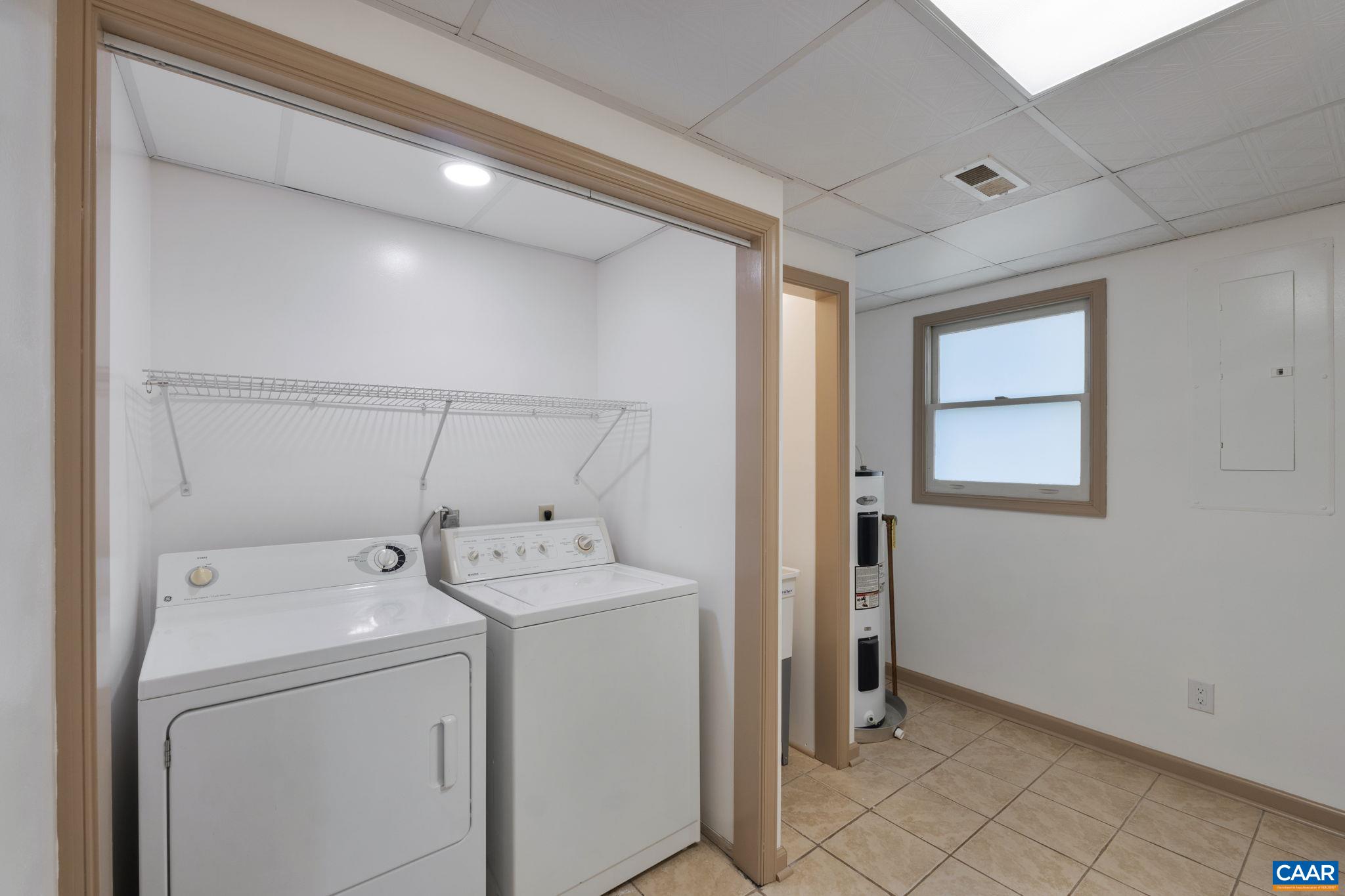 3580 Welsh Run Road Ruckersville, VA 22968 - Photo 32 of 44 a utility room with dryer and washer