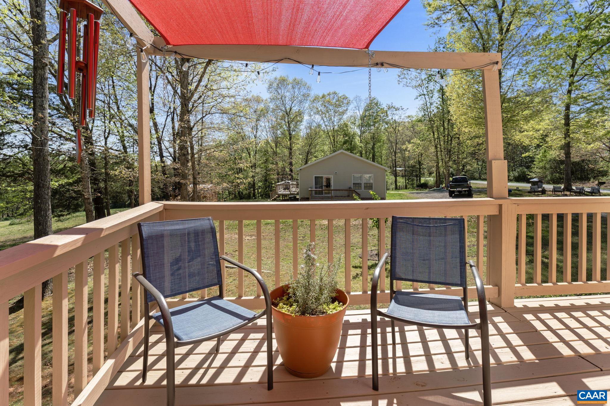 3580 Welsh Run Road Ruckersville, VA 22968 - Photo 37 of 44 a view of a chairs and table in the roof deck