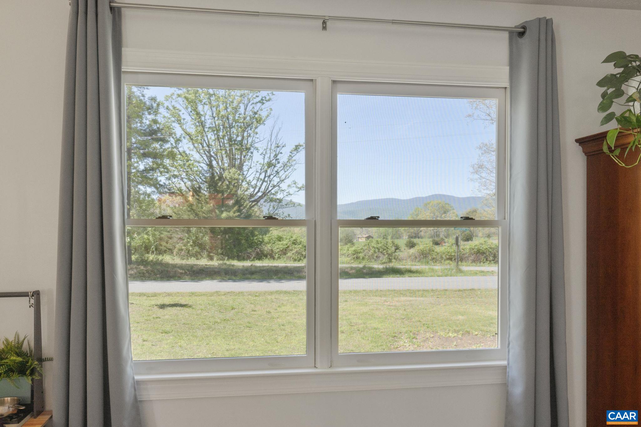 3580 Welsh Run Road Ruckersville, VA 22968 - Photo 8 of 44 a view of a room that has a bed