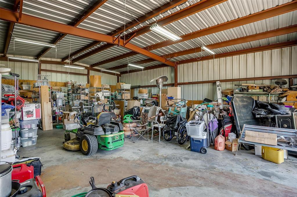 819 Old Annetta Road Aledo, TX 76008 - Photo 39 of 39 a view of a storage room with lots of stuff