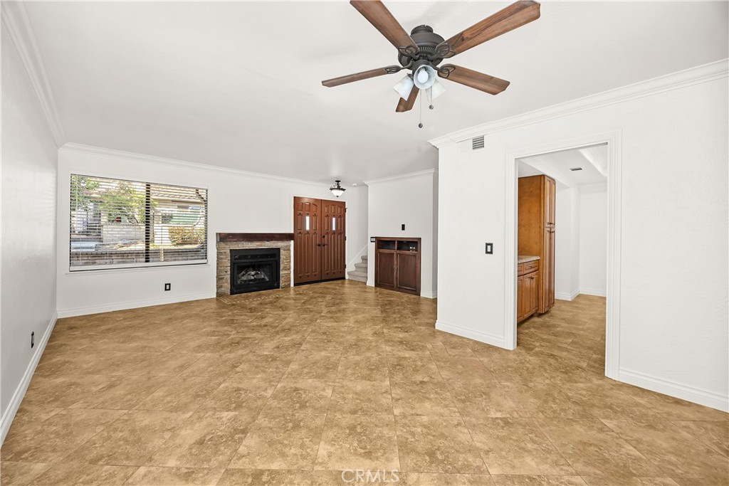 9862 Solazzo Drive Rancho Cucamonga, CA 91730 - Photo 11 of 30 an empty room with windows and cabinet