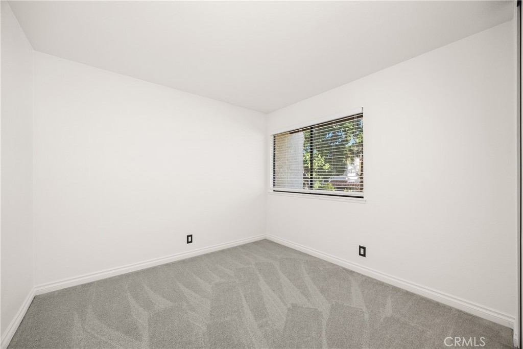 9862 Solazzo Drive Rancho Cucamonga, CA 91730 - Photo 19 of 30 a view of an empty room with a window