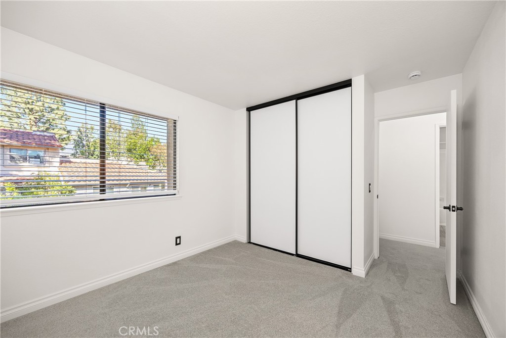 9862 Solazzo Drive Rancho Cucamonga, CA 91730 - Photo 20 of 30 a view of an empty room with a window